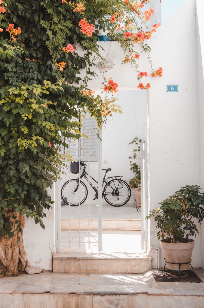Bicycle and flowers in Parikia